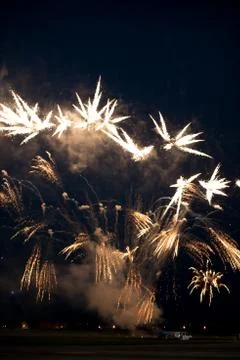 Multiple golden fireworks Stock Photos