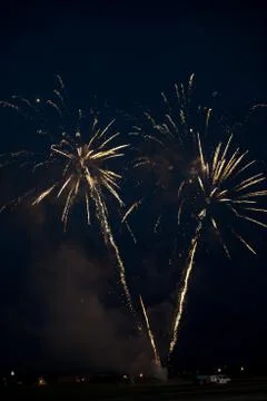 Multiple golden fireworks Stock Photos