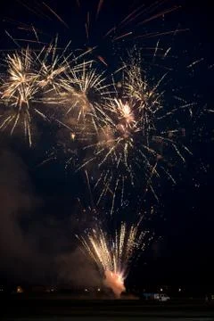 Multiple golden fireworks Stock Photos