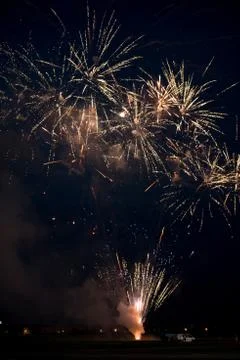 Multiple golden fireworks Stock Photos