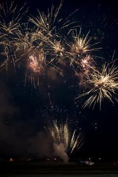 Multiple golden fireworks Stock Photos