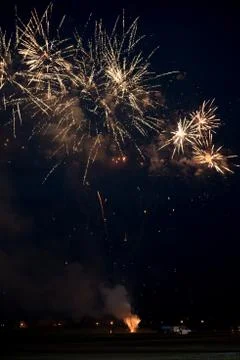 Multiple golden fireworks Stock Photos