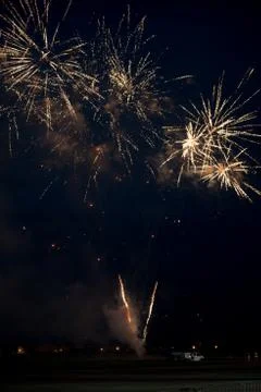 Multiple golden fireworks Stock Photos