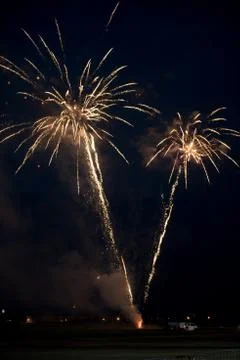 Multiple golden fireworks Stock Photos
