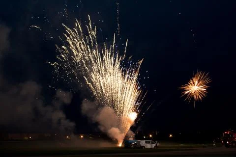 Multiple golden fireworks Stock Photos