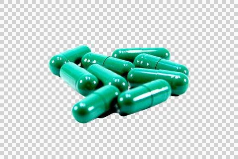 Multiple green capsule pills isolated on white background.Selection focus. Stock Photos
