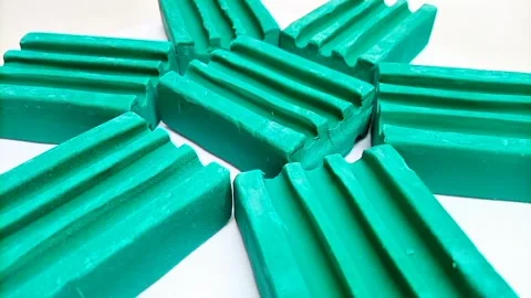 Multiple Green Dishwashing Soap Bars Rotating on White Background, Stock Footage Video stock 332324427