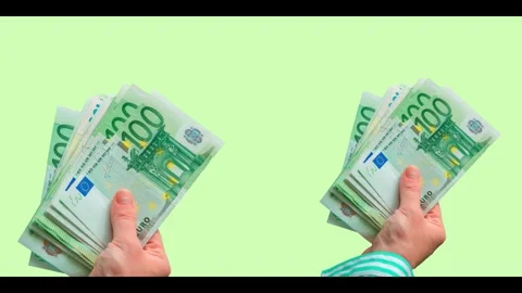Multiple hands holding euro banknotes under dripping oil drops. fuel prices Video stock 332242209