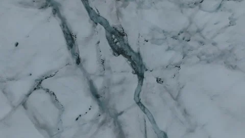 Multiple Ice Streams Cutting Through Greenland Ice Sheet Aerial 1 Stock Footage 292941427