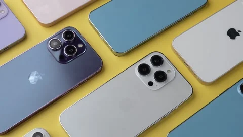 Multiple iPhones Arranged Together on Table Stock Footage 343428291