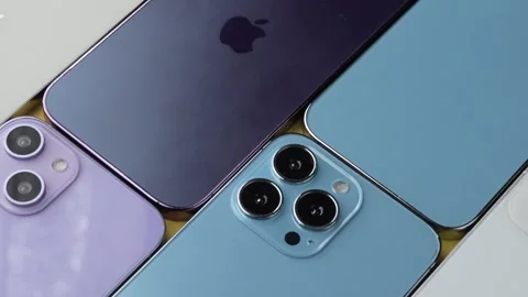 Multiple iPhones Arranged Together on Table Stock Footage 343428324