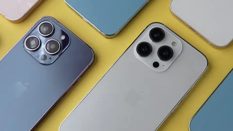 Multiple iPhones Arranged Together on Table Stock Footage 343428340