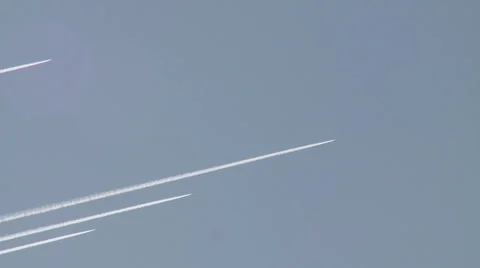 Multiple Jet Contrails Streak Across the Sky 스톡 동영상 54713397