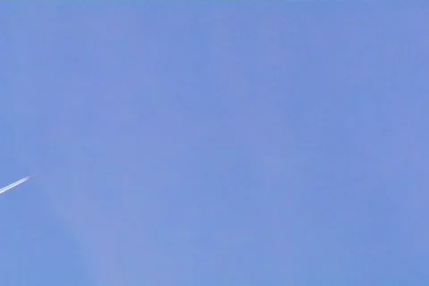 Multiple Jet Vapor Trails in the Sky Stock Footage 377780