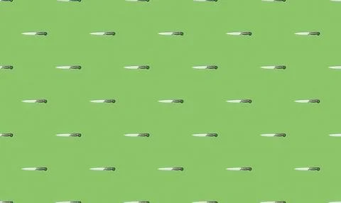 Multiple knives arranged on a green surface Stock Illustration