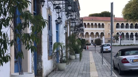 Multiple Lamps out of Old Architecture Buildings with Blue Windows in Nicosia Stock Footage 90696062