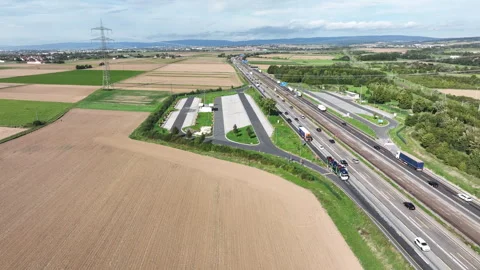 Multiple lane highway, rest area - aerial view Stock Footage 250898755