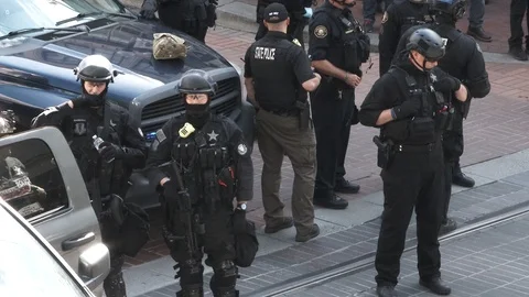 Multiple Law Enforcement Agencies Take Over City Streets Video stock 76748096