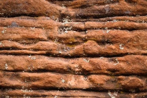 Multiple layers of eroded and striated sandstone Stock Photos