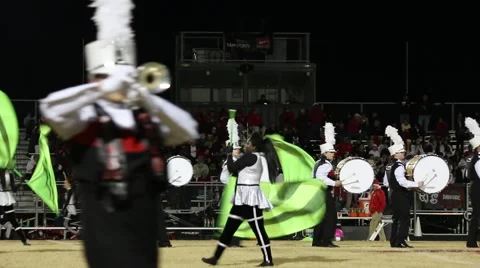 Multiple Layers of Marching Band Members and Majorettes Twirling Flags Stock Footage 43483182