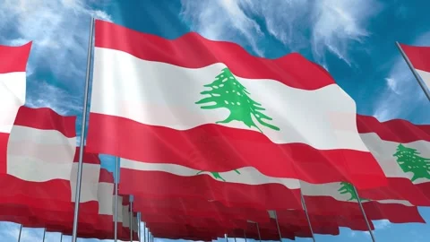 Multiple Lebanon flags seamless looping waving on blue sky Stock Footage 343682238