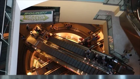 Multiple Levels of Escalators Inside a Mall Stock Footage 71358721