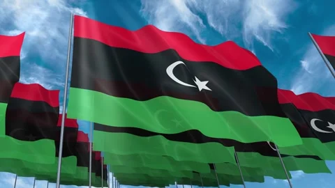 Multiple Libya flags seamless looping waving on blue sky Stock Footage 343682291