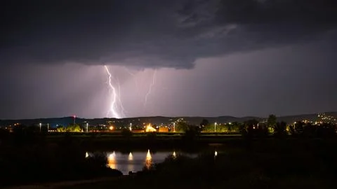 Multiple lightning during thunderstorm at night Stock Photos