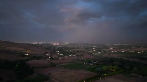 Multiple Lightning Strikes Over Yakima Valley at Night Stock Footage 345888047