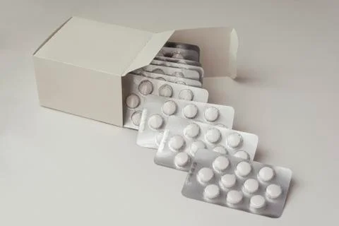 Multiple Loafs of Tablets Getting Out Form the Box Stock Photos