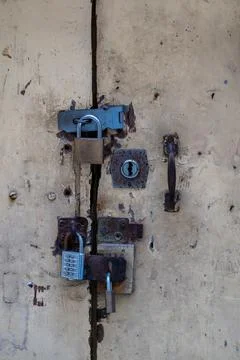 Multiple Locks on an Old Door Stock Photos