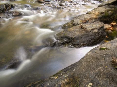 Multiple long exposure composite of the stream of the Moniquira river, a trop Stock Photos