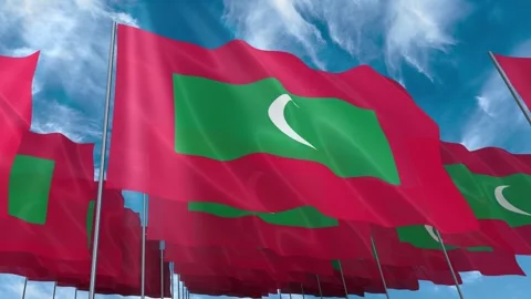 Multiple Maldives flags seamless looping waving on blue sky Stock Footage 343682682