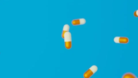 Multiple medicine pills falling endlessly Stockbeeldmateriaal 145433377