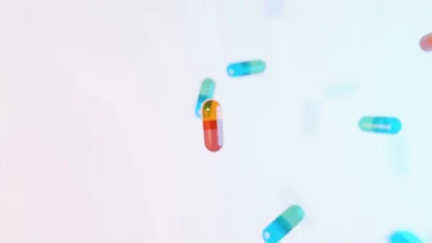 Multiple medicine pills falling endlessly Stockbeeldmateriaal 145968149