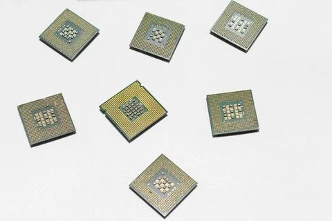 Multiple microchips arranged in an abstract design on a clean, white backgr.. Stock Photos