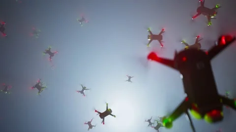 Multiple modern drones fly chaotically in the air. Seamless looping animation 4K Video stock 201243484