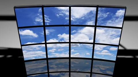 Multiple Monitors Reflecting the Clouds Stock Footage 327612382