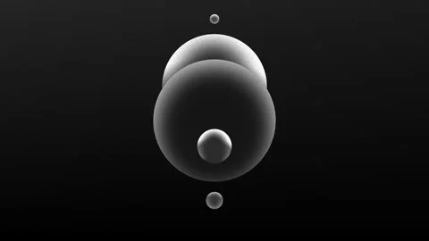Multiple monochrome shaded spheres drift to align themselves in a smooth Stock Footage 333019730