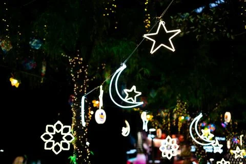 Multiple Neon Crescent Moon Star and Arabesque Light Display Фото