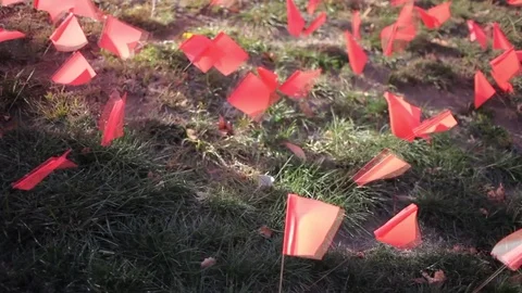 Multiple orange marker flags blowing in the breeze in slo motion 스톡 동영상 82400889