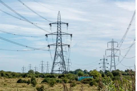 Multiple overhead line power pylon Stock Photos