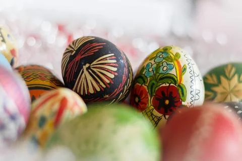 Multiple painted easter eggs lying on top of each other 写真素材