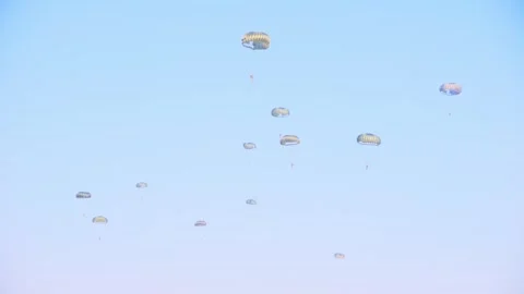 Multiple parachutists descending during the Airborne Ede event, Ginkelse Stock Footage 286336661