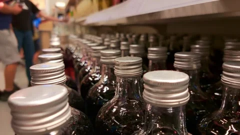 Multiple people choose and take glass bottles Stock Footage 317162384