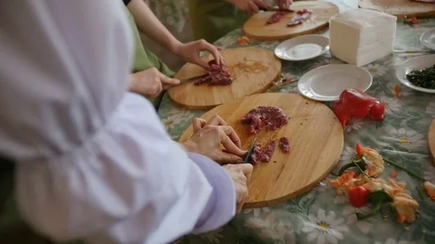 Multiple people slices Raw Meat On Wooden Board Stock Footage 75393789