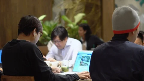 Multiple People Working on Laptop At Cafe Stock Footage 94942135