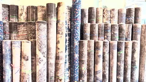 Multiple Persian carpets for sale at the store. Stock Footage 336655166