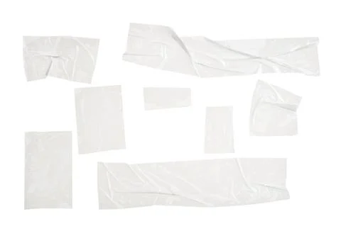 Multiple pieces of clear adhesive tape with wrinkles and texture, isolated on Stockfoto's
