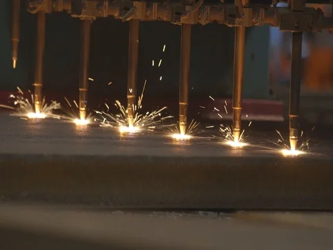 Multiple plasma cutters cutting steel Stock Footage 75406309
